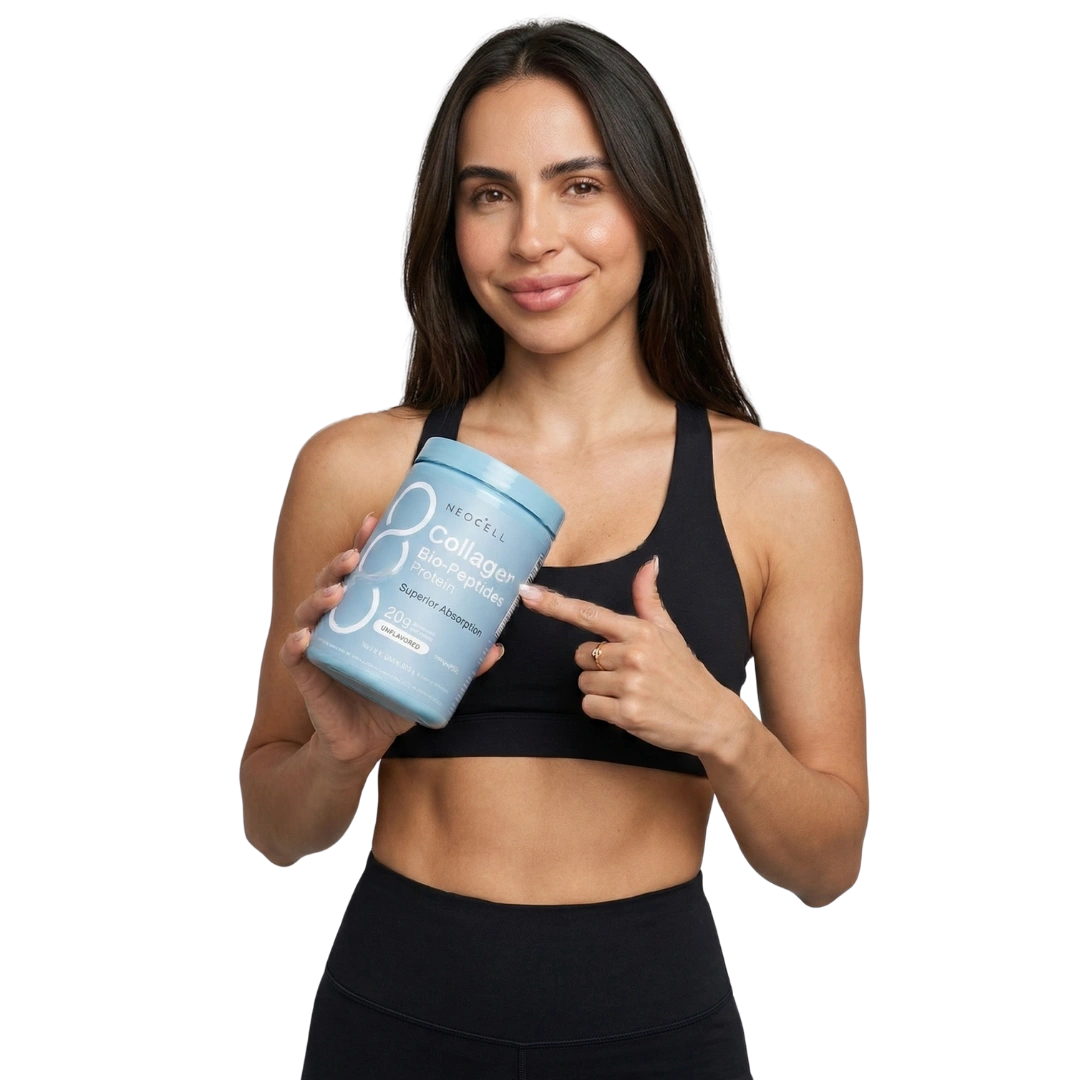 Smiling woman holding softgel